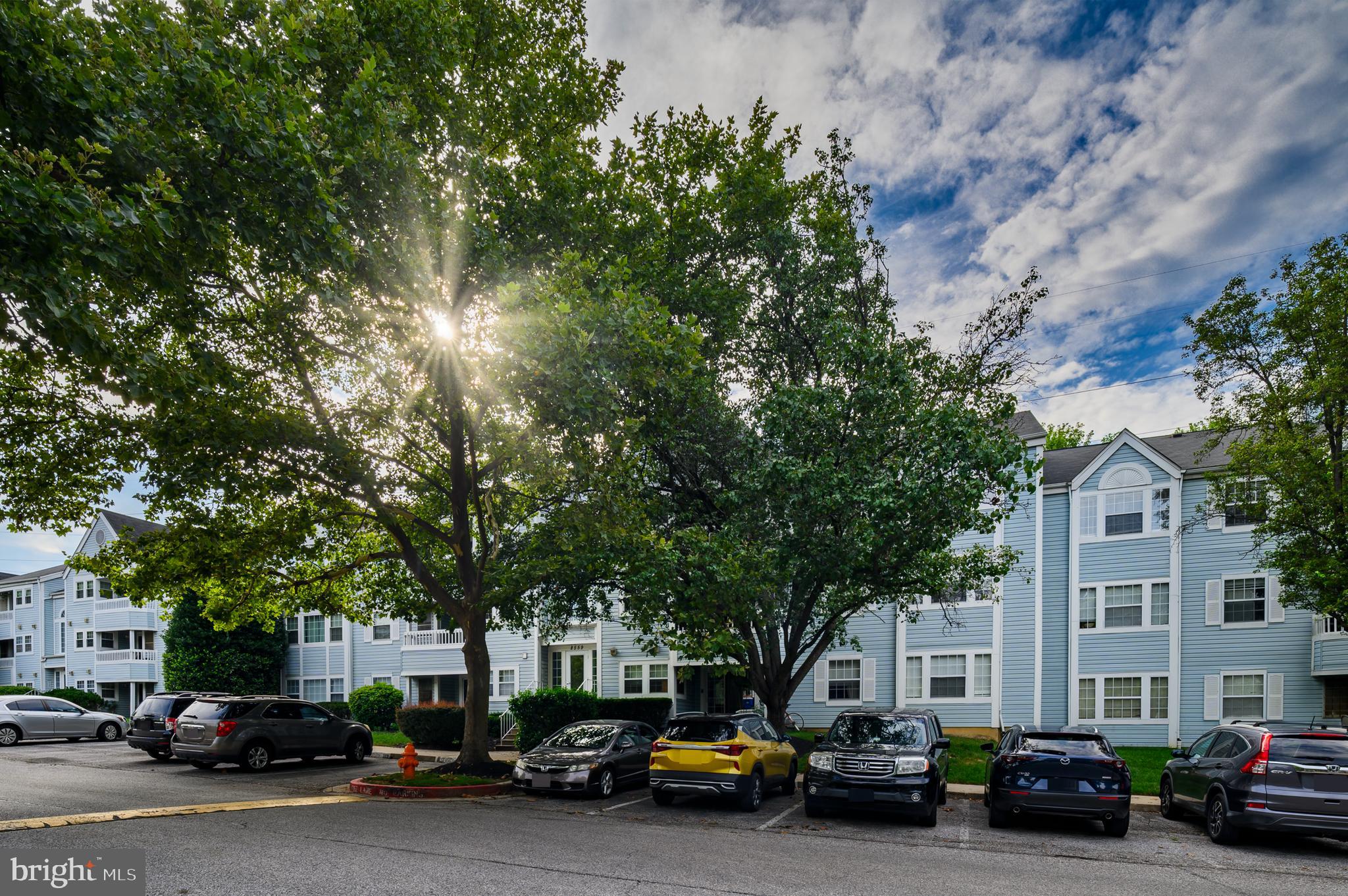 8559 Falls Run Road, Unit L Ellicott City, MD 21043 - Photo 26 of 28 a car parked in front of a building