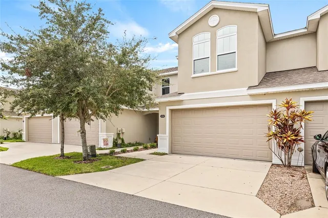 a view of a house with swimming pool