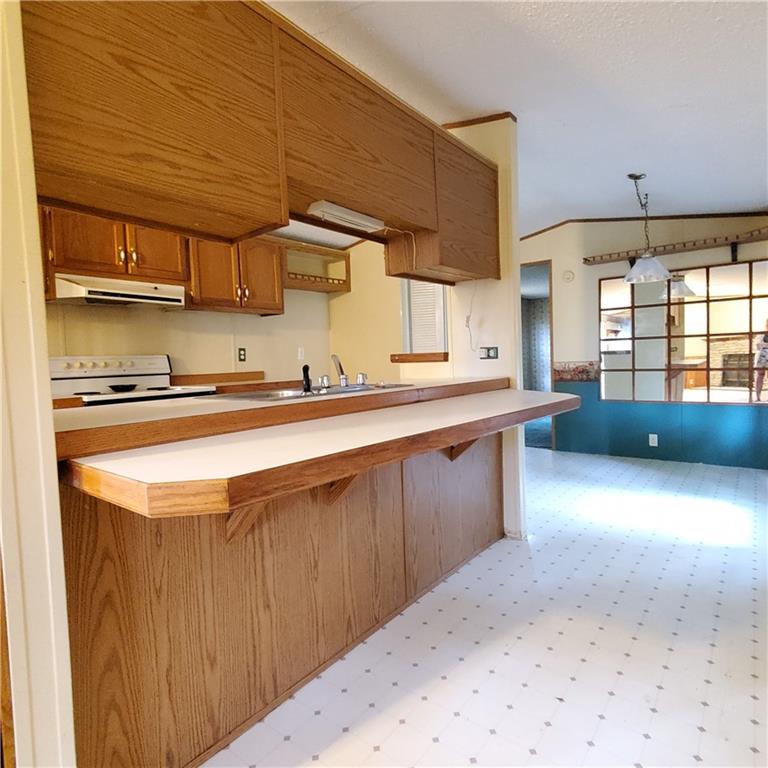 608 Amy Lane Butler, PA 16001 - Photo 6 of 18 a kitchen with stainless steel appliances a sink a stove and a refrigerator