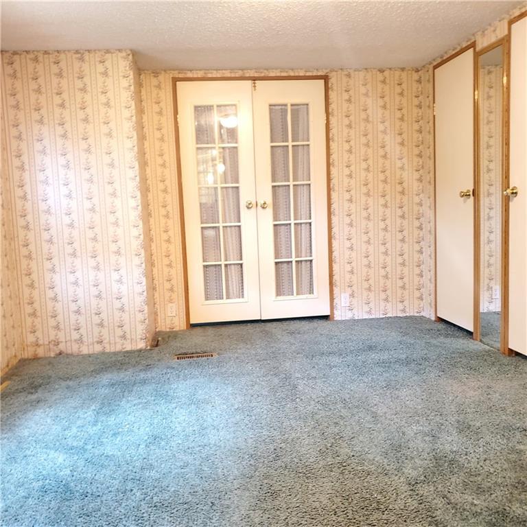 608 Amy Lane Butler, PA 16001 - Photo 9 of 18 an empty room with windows