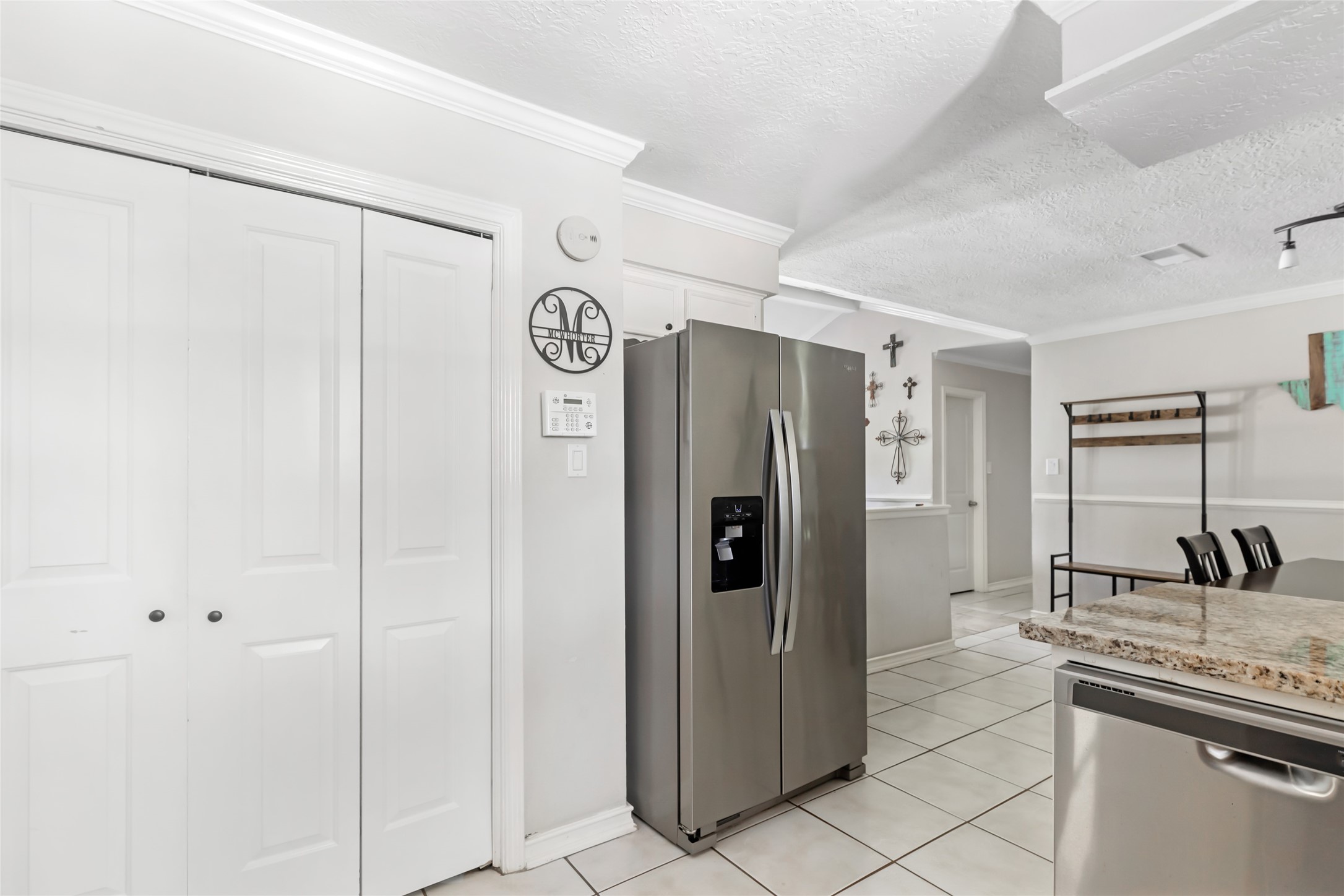 15816 Ramsey Road Crosby, TX 77532 - Photo 12 of 24 a kitchen with stainless steel appliances granite countertop a refrigerator and a sink