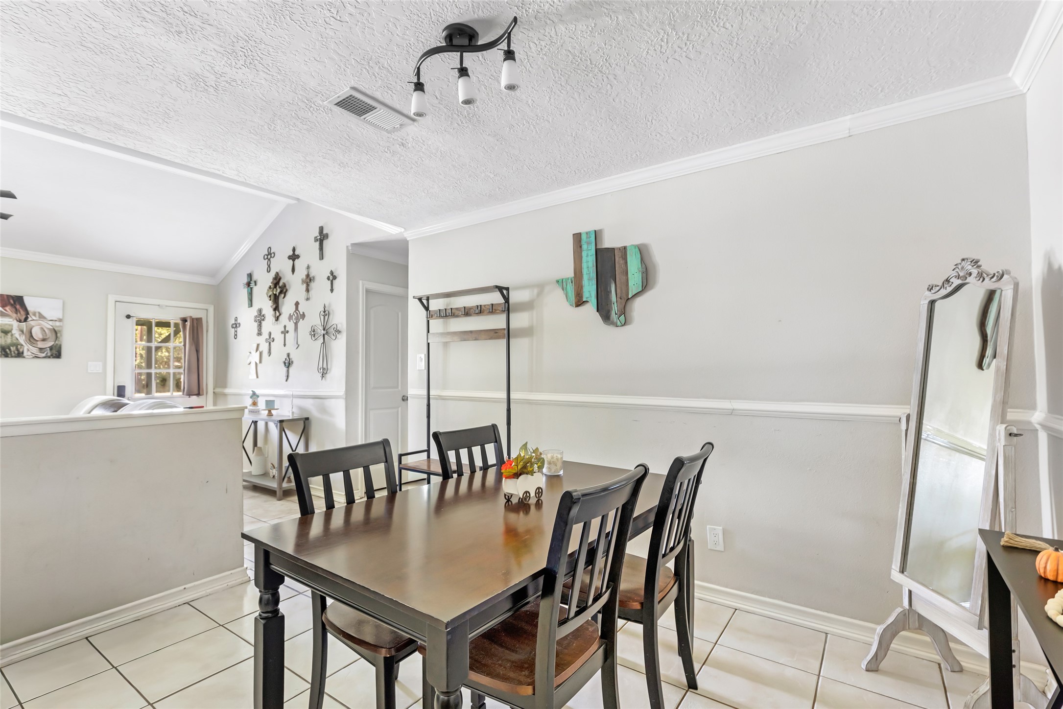 15816 Ramsey Road Crosby, TX 77532 - Photo 15 of 24 a view of a dining room with furniture