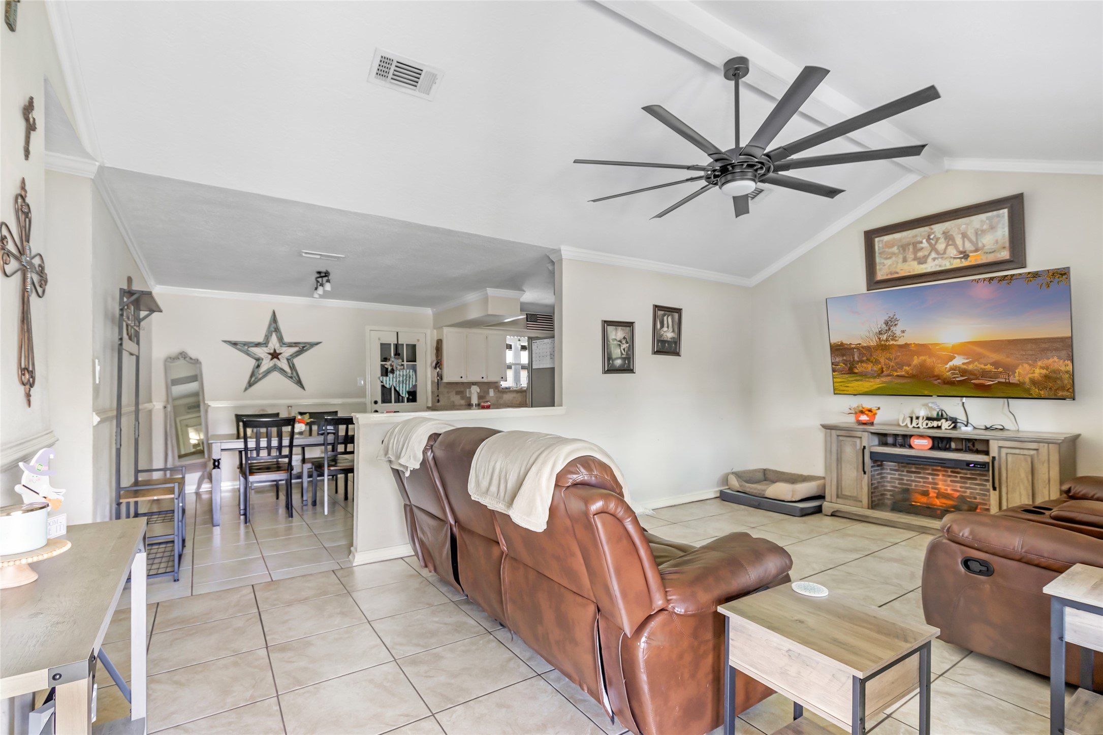 15816 Ramsey Road Crosby, TX 77532 - Photo 18 of 24 a living room with furniture and a flat screen tv