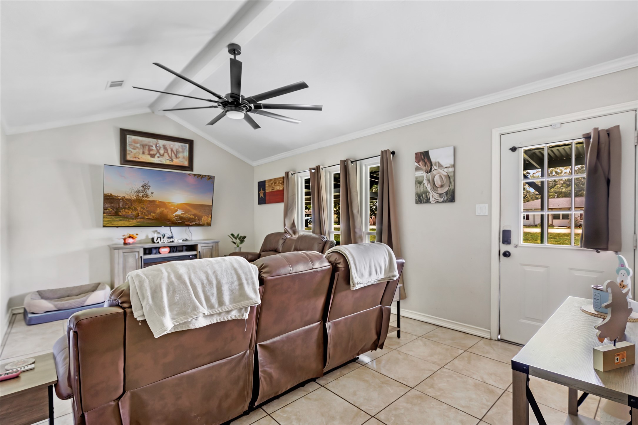 15816 Ramsey Road Crosby, TX 77532 - Photo 19 of 24 a living room with furniture and a flat screen tv