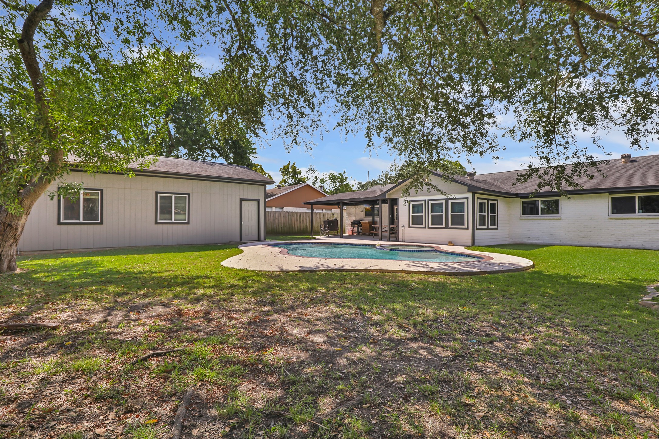 15816 Ramsey Road Crosby, TX 77532 - Photo 2 of 24 a front view of a house with a garden