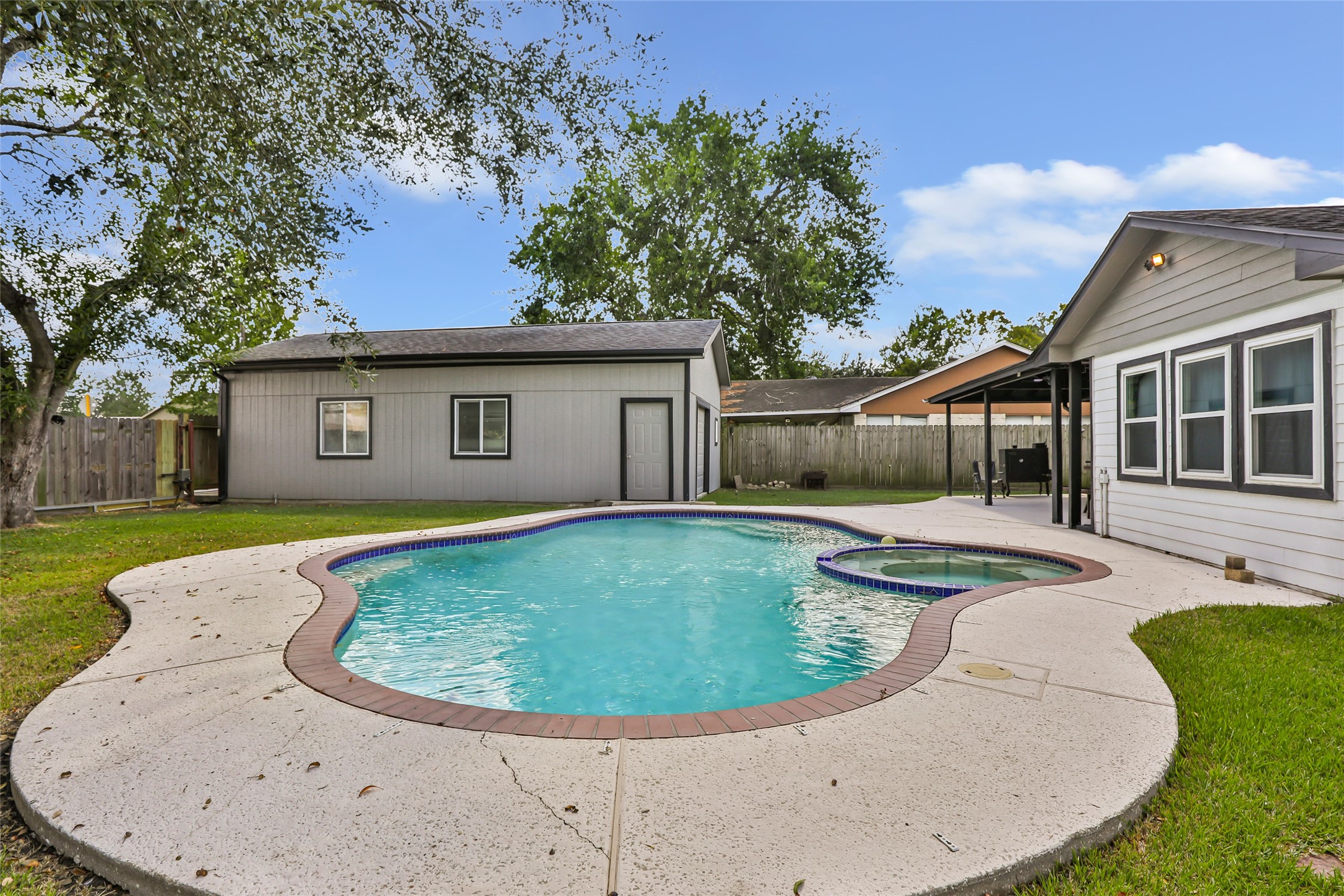 15816 Ramsey Road Crosby, TX 77532 - Photo 3 of 24 a view of a house with a backyard