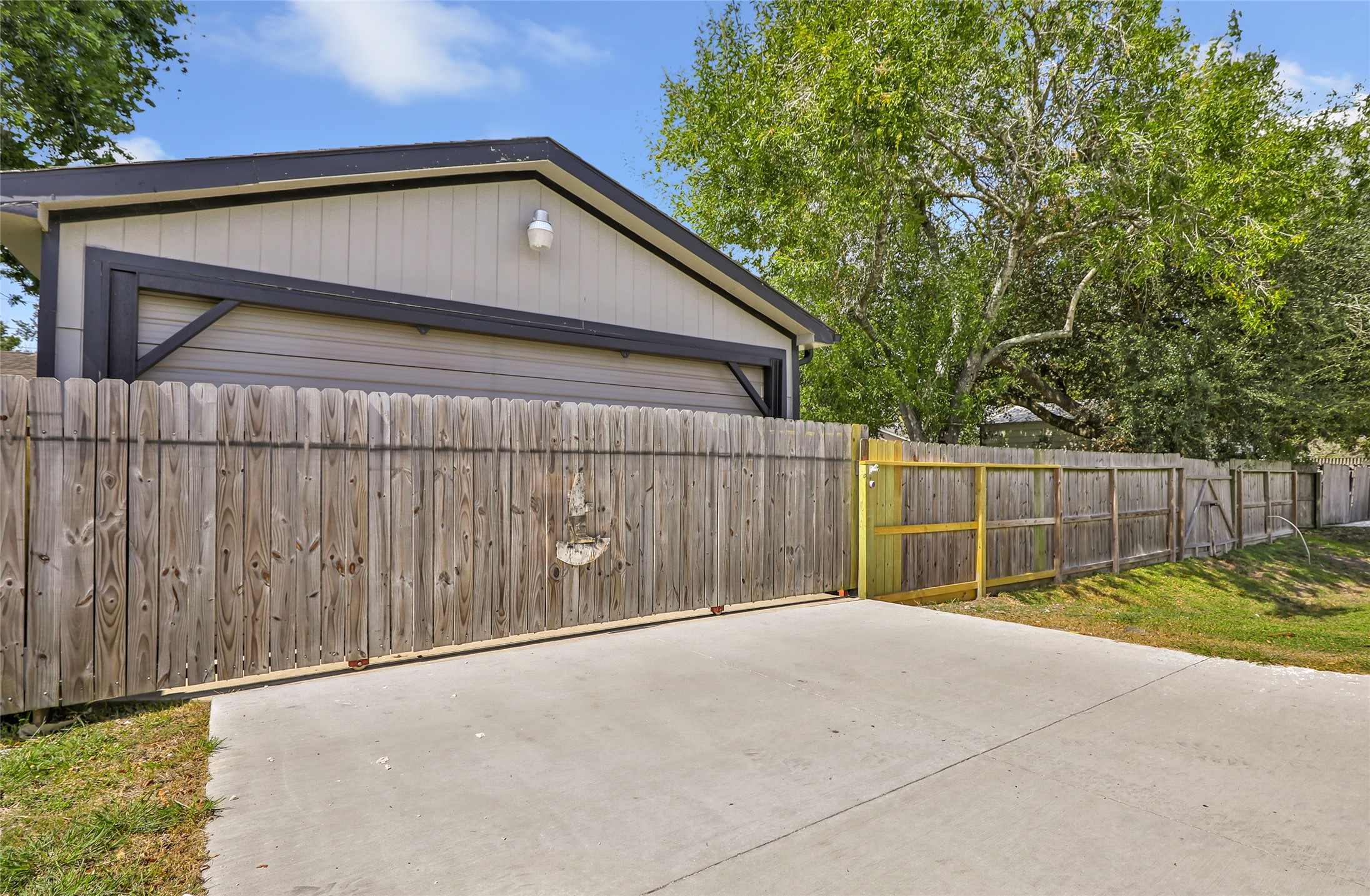 15816 Ramsey Road Crosby, TX 77532 - Photo 4 of 24 a view of backyard with wooden fence