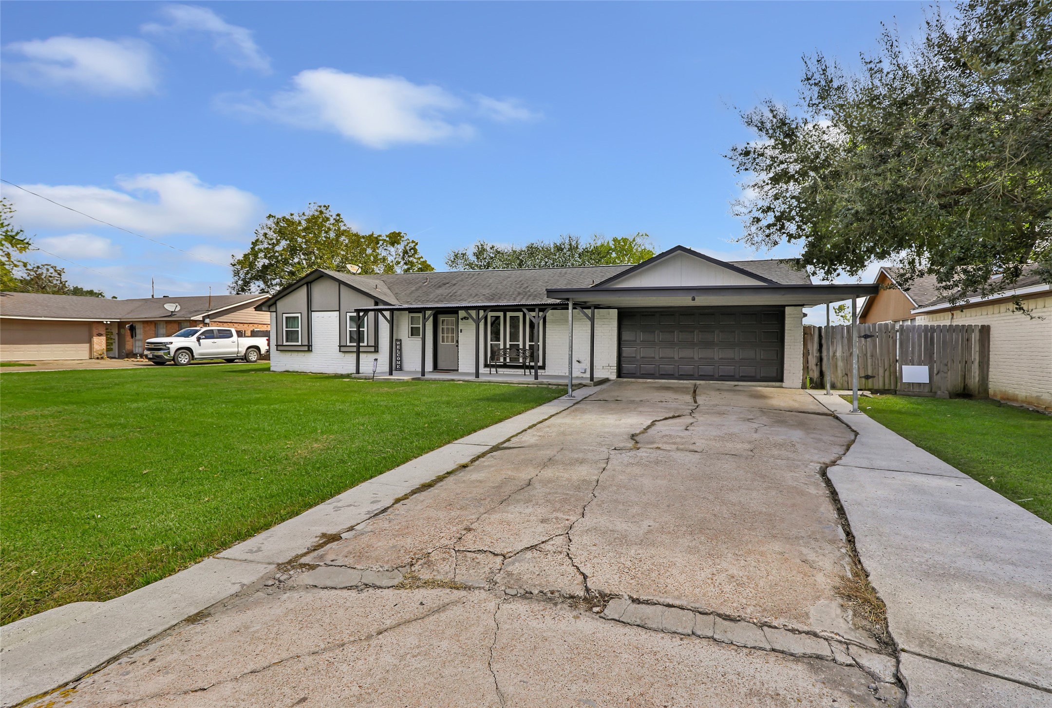 15816 Ramsey Road Crosby, TX 77532 - Photo 5 of 24 a front view of a house with garden