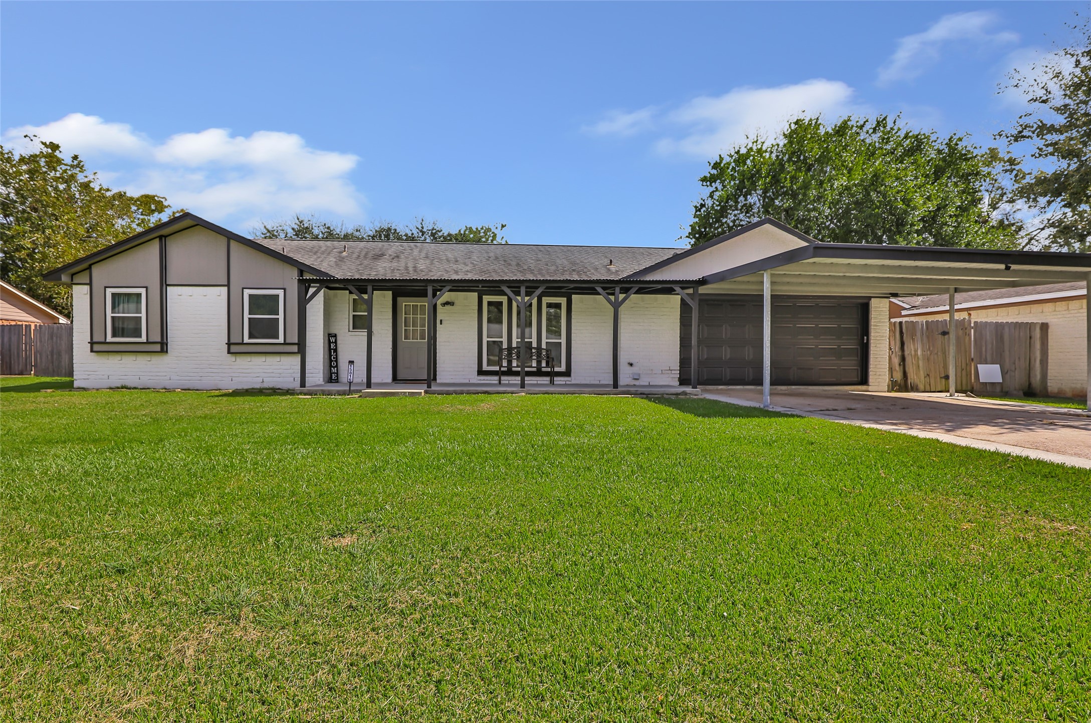 15816 Ramsey Road Crosby, TX 77532 - Photo 6 of 24 a front view of house with yard and green space