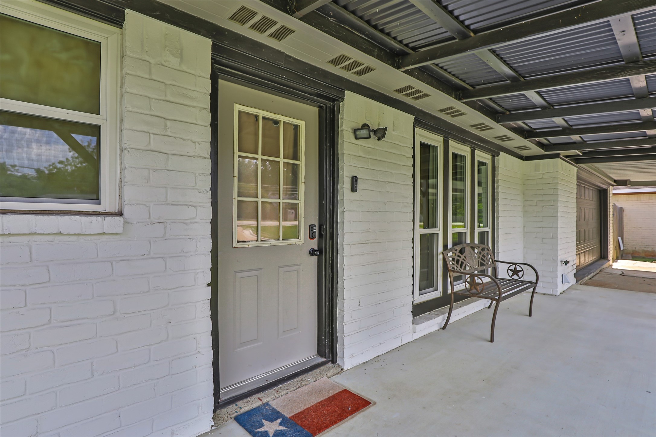15816 Ramsey Road Crosby, TX 77532 - Photo 7 of 24 a view of a door and chair in front of house