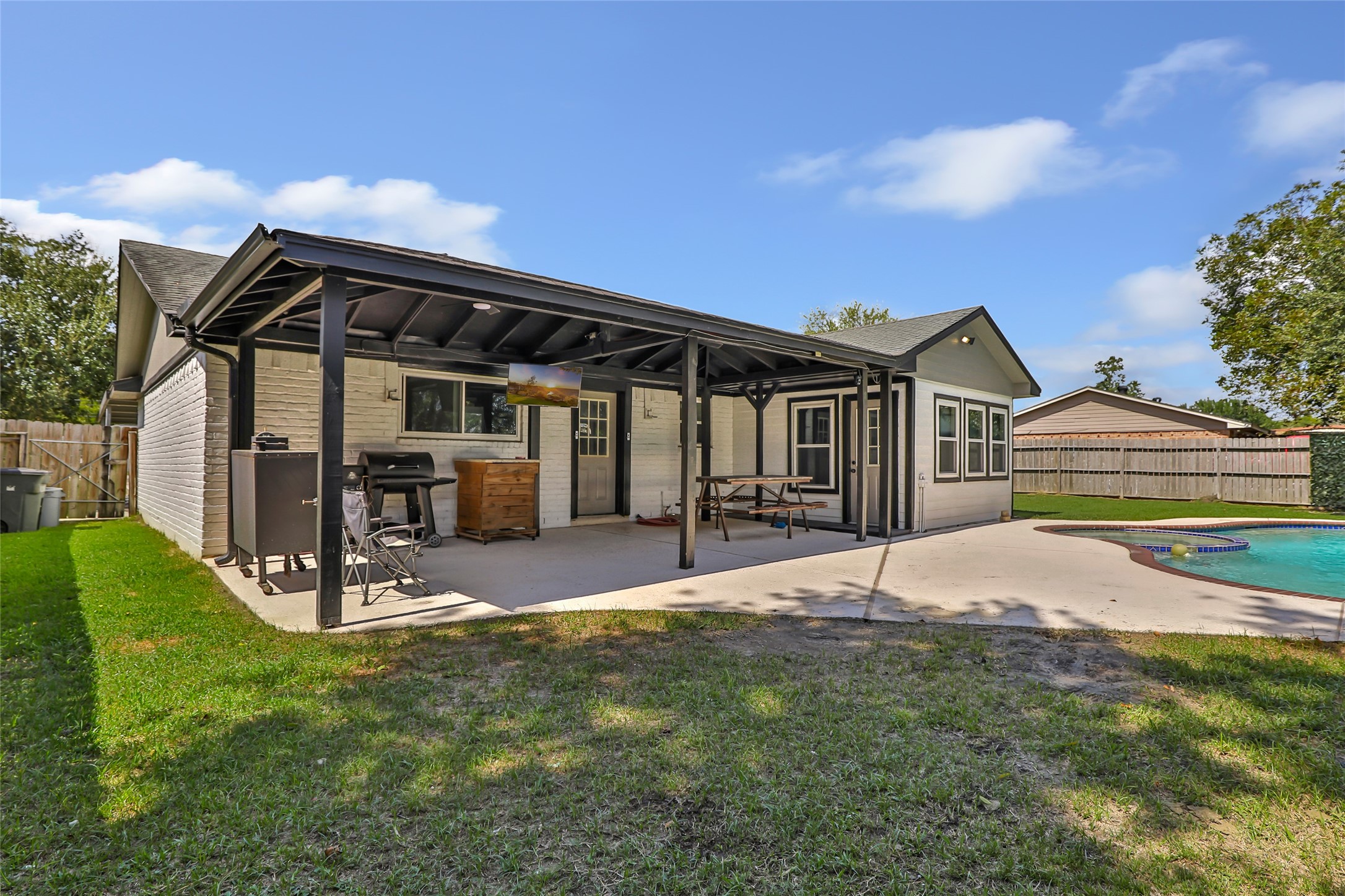 15816 Ramsey Road Crosby, TX 77532 - Photo 8 of 24 a view of a house with backyard and porch