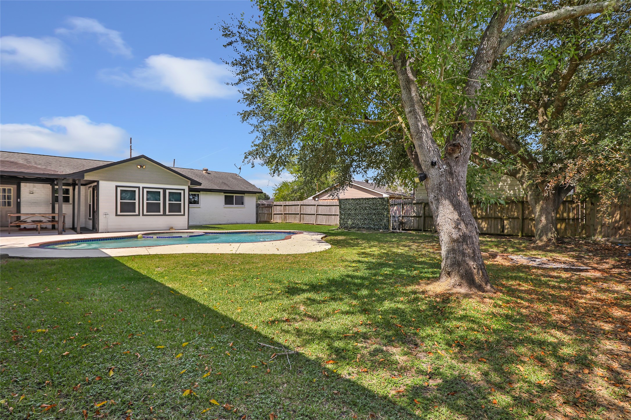 15816 Ramsey Road Crosby, TX 77532 - Photo 9 of 24 a view of house with outdoor space and swimming pool