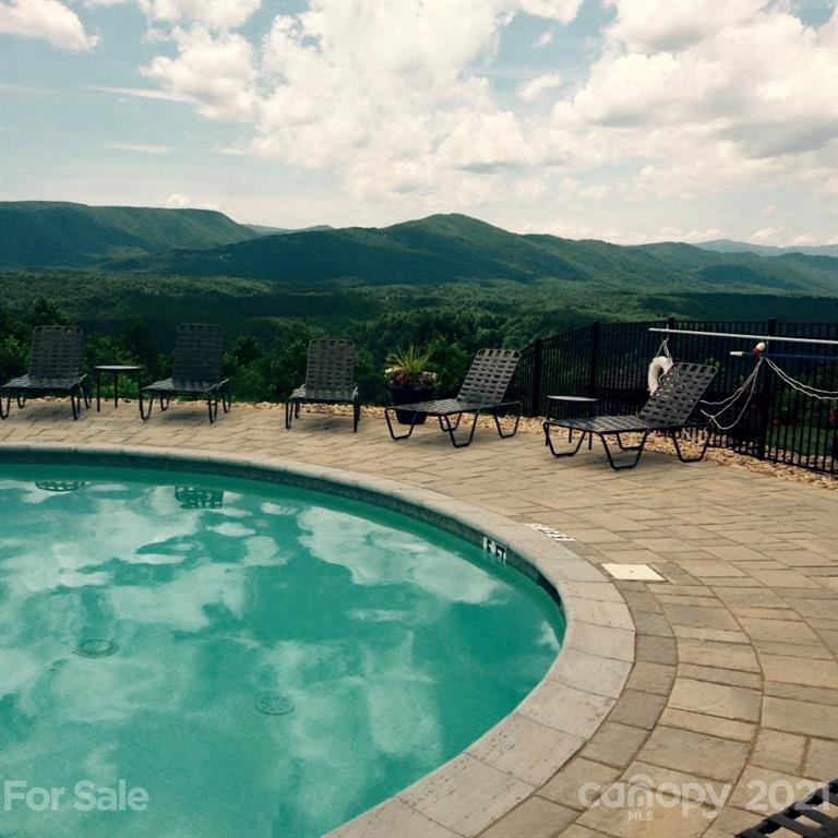 0 Red Cedar Way Lenoir, NC 28645 - Photo 18 of 37 a view of swimming pool with a yard and mountain view