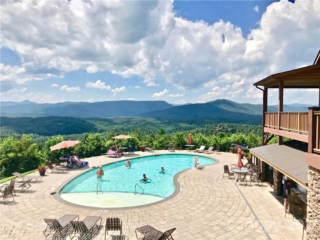 0 Red Cedar Way Lenoir, NC 28645 - Photo 19 of 37 a view of a swimming pool with a patio and a yard