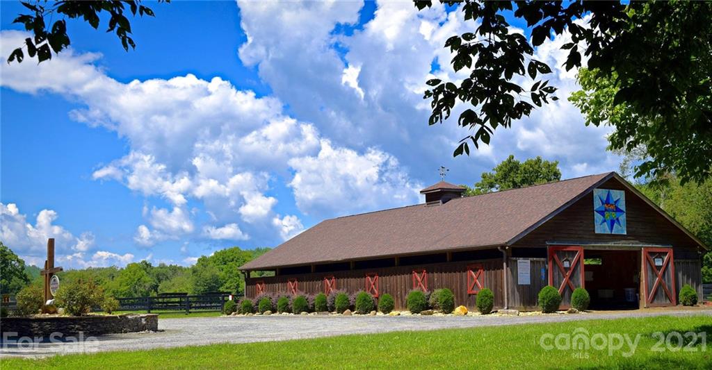 0 Red Cedar Way Lenoir, NC 28645 - Photo 20 of 37 a front view of a house with garden