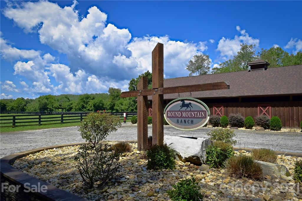 0 Red Cedar Way Lenoir, NC 28645 - Photo 25 of 37 a front view of a house with garden