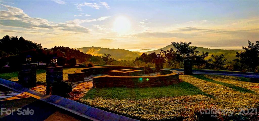 0 Red Cedar Way Lenoir, NC 28645 - Photo 27 of 37 a view of a lake with a mountain