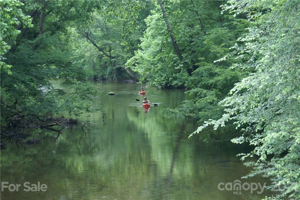 0 Red Cedar Way Lenoir, NC 28645 - Photo 35 of 37 a view of a green field with lots of trees