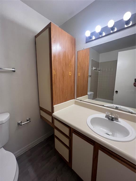 1061 South Hiawassee Road, Unit 1724 Orlando, FL 32835 - Photo 8 of 10 a bathroom with a sink and a mirror