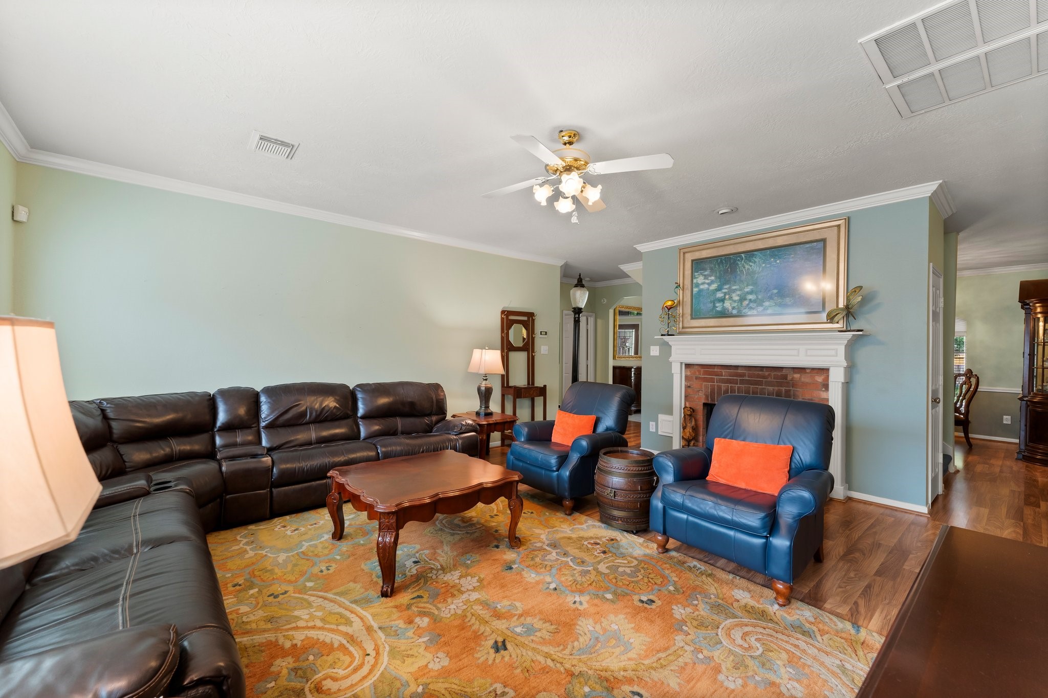 4210 Rainfall Drive Pasadena, TX 77505 - Photo 17 of 46 a living room with furniture and a fireplace