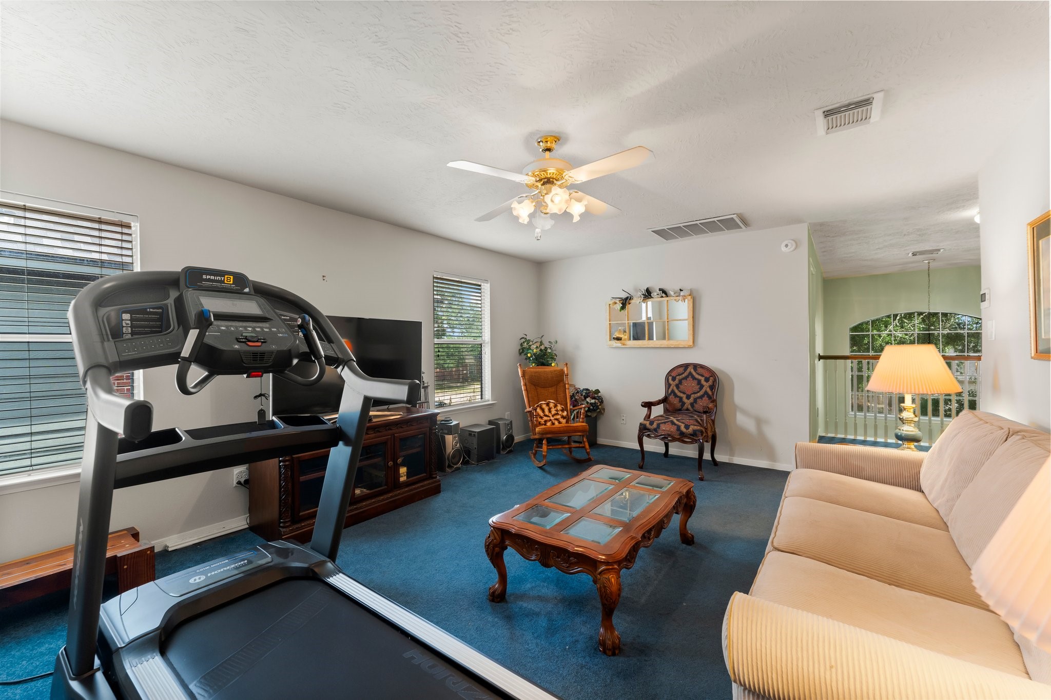 4210 Rainfall Drive Pasadena, TX 77505 - Photo 21 of 46 a living room with furniture and a flat screen tv