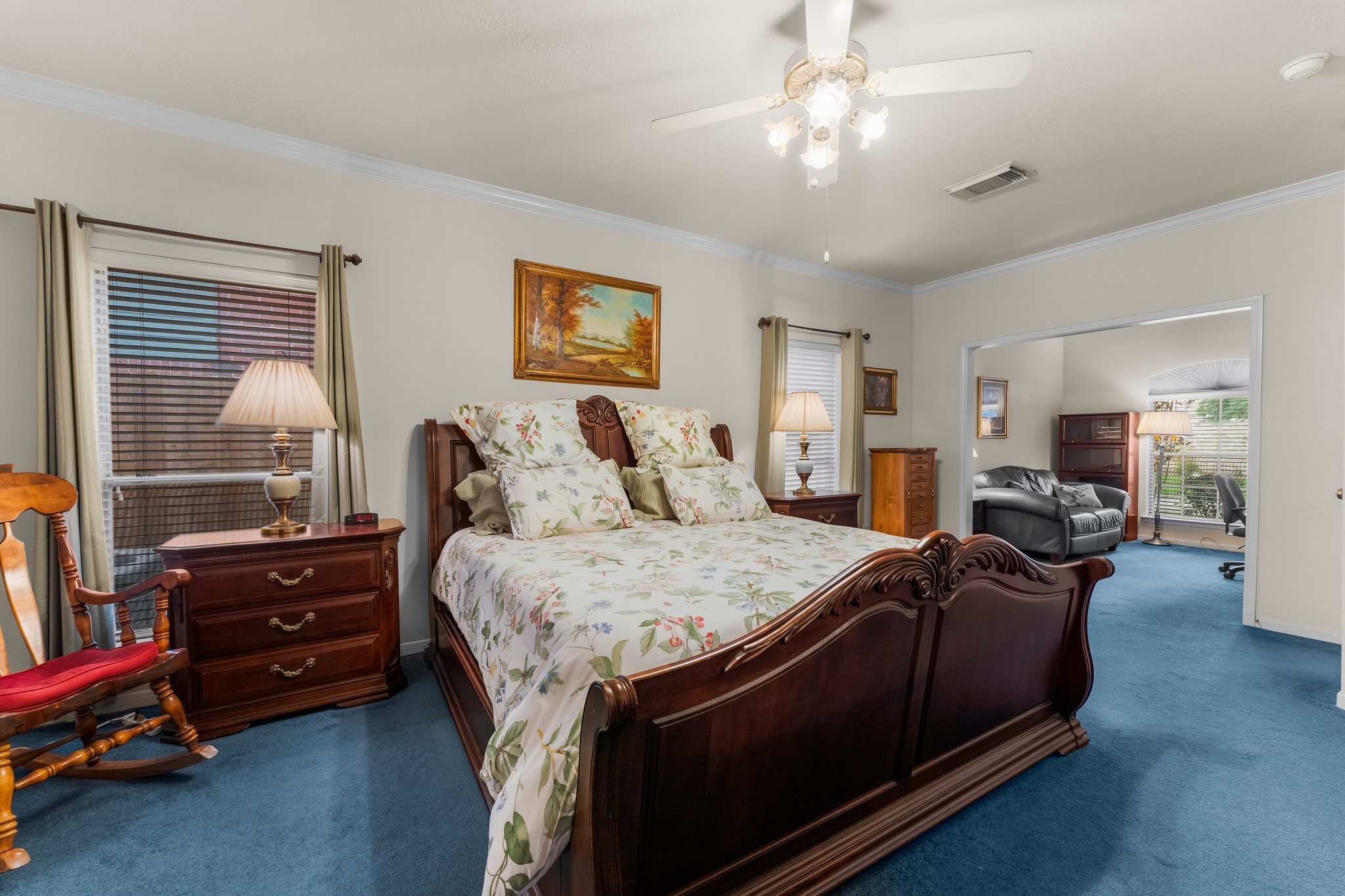 4210 Rainfall Drive Pasadena, TX 77505 - Photo 24 of 46 a spacious bedroom with a bed and wooden floor