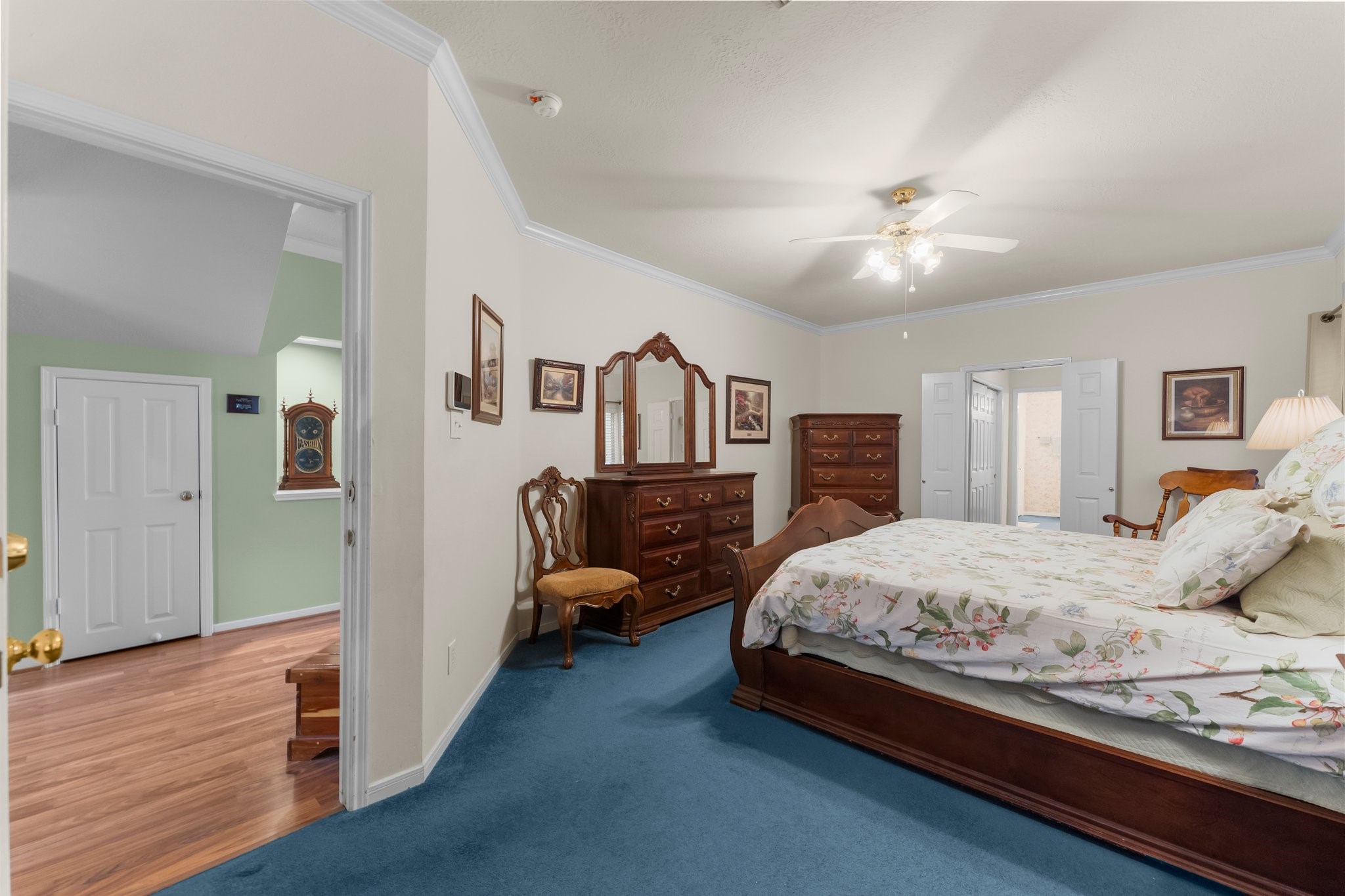4210 Rainfall Drive Pasadena, TX 77505 - Photo 25 of 46 a spacious bedroom with a bed and dresser