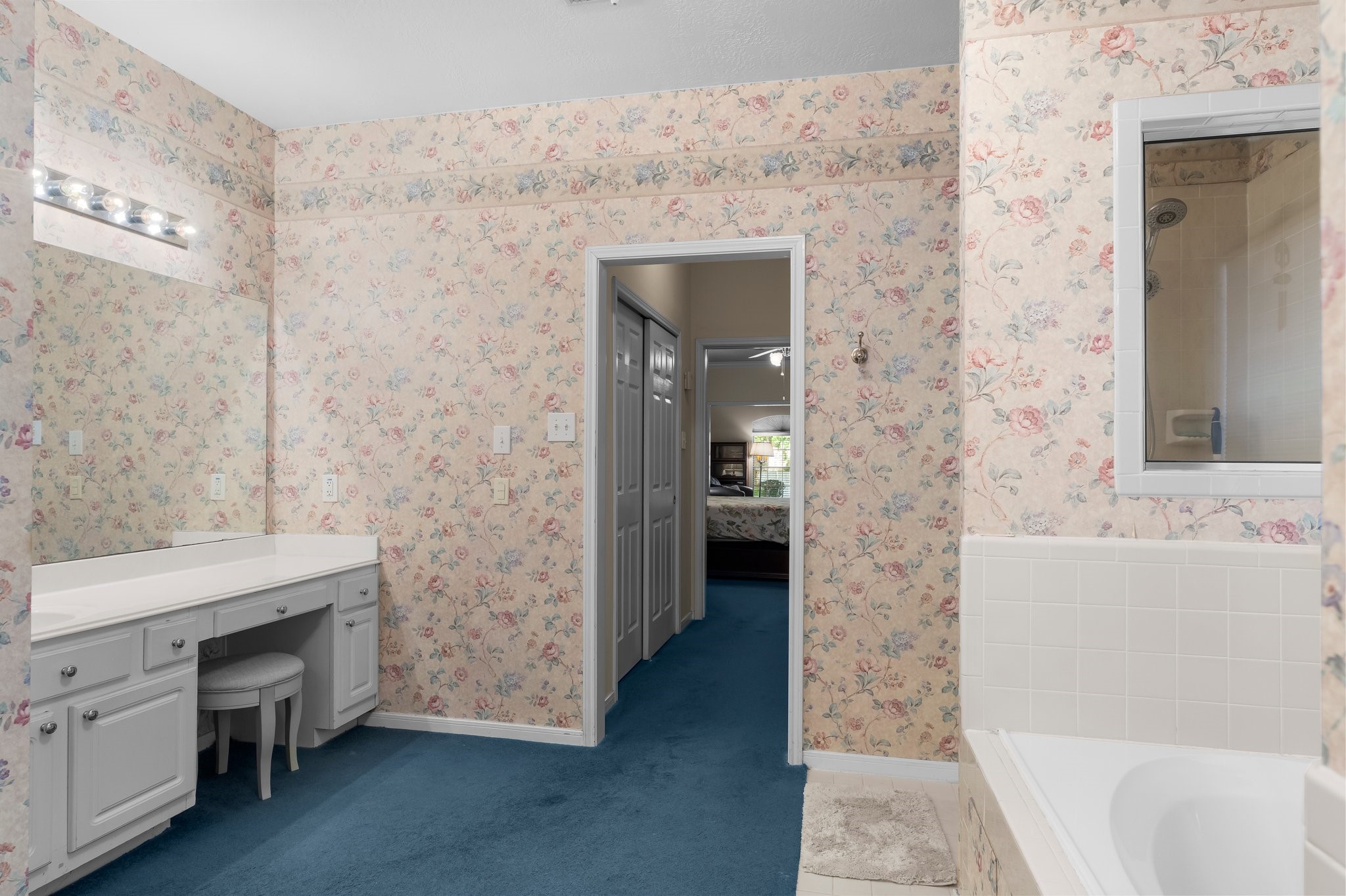 4210 Rainfall Drive Pasadena, TX 77505 - Photo 28 of 46 a bathroom with a sink and a mirror