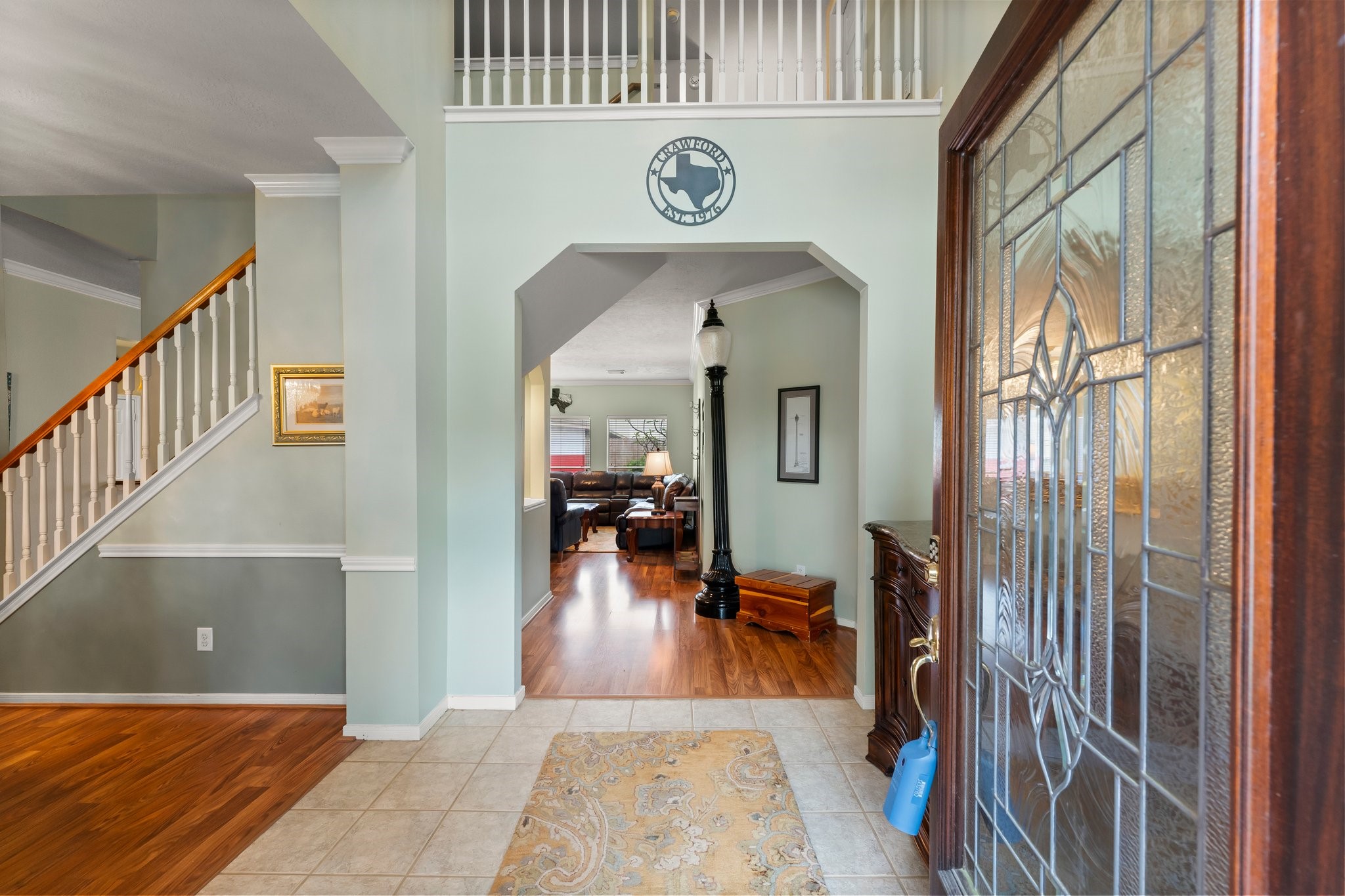 4210 Rainfall Drive Pasadena, TX 77505 - Photo 3 of 46 a view of entryway and hall with wooden floor