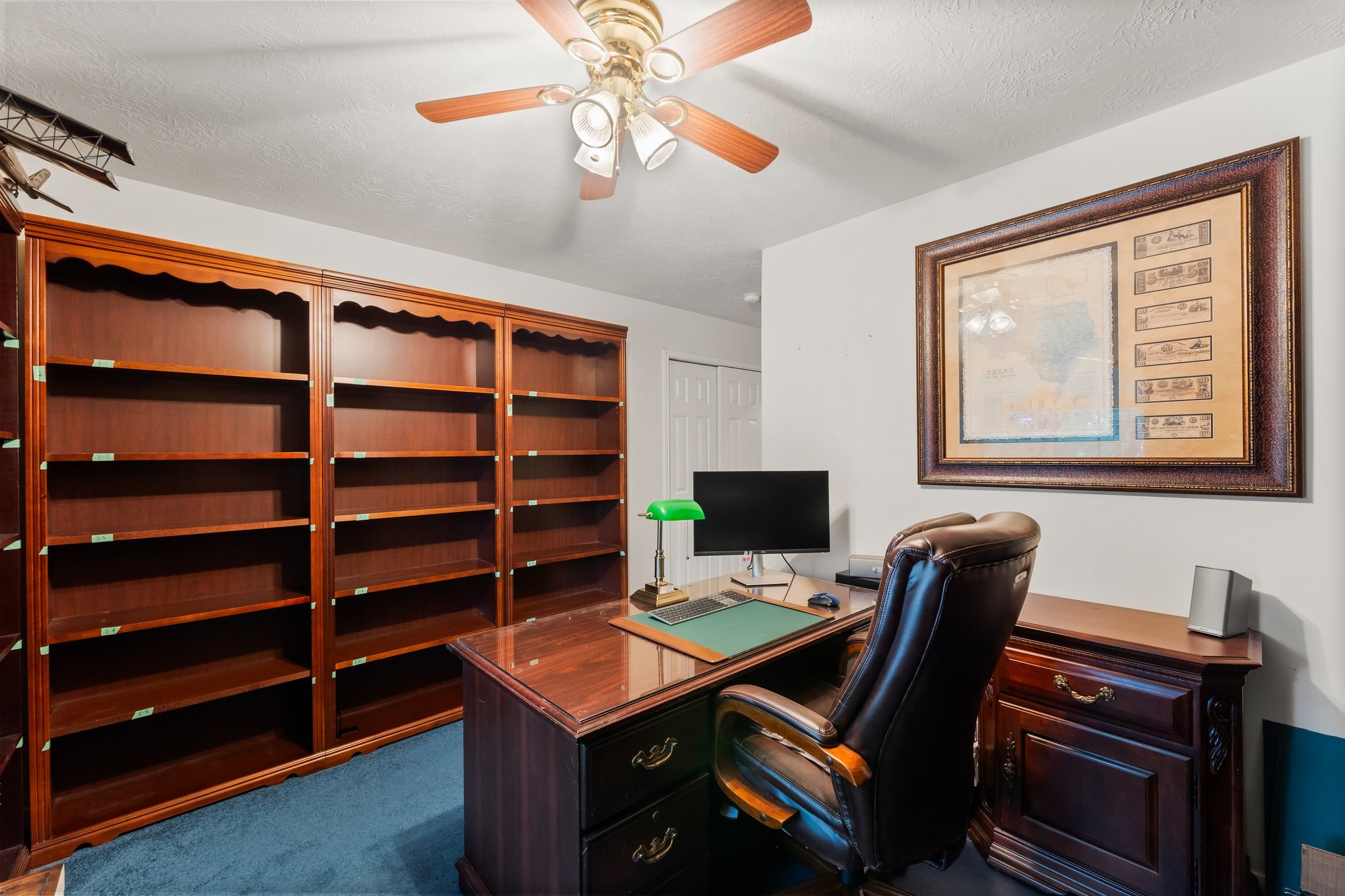 4210 Rainfall Drive Pasadena, TX 77505 - Photo 33 of 46 a view of a workspace with furniture and a window