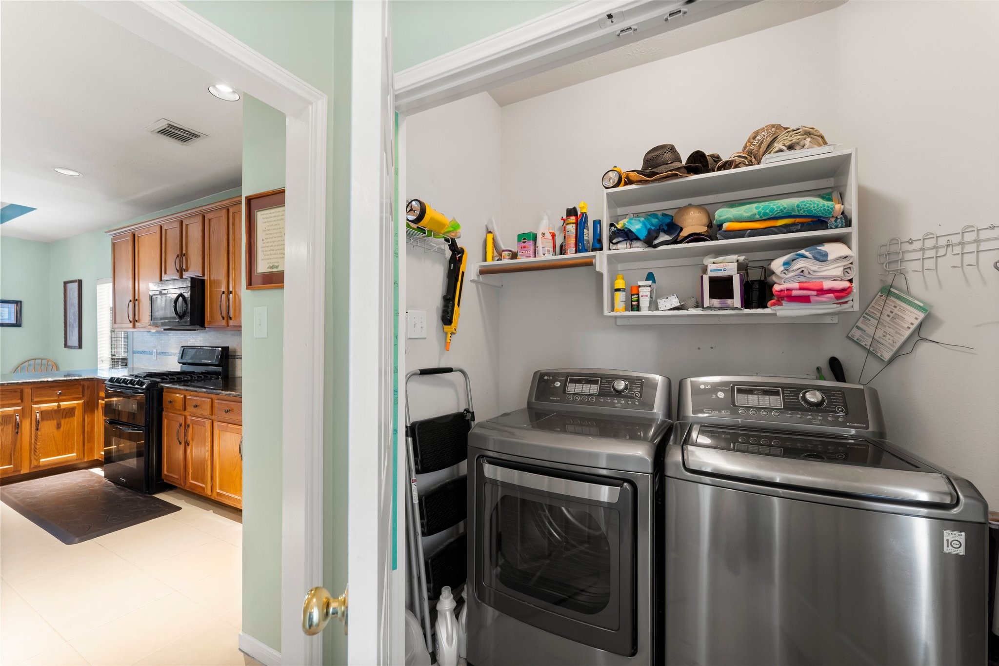 4210 Rainfall Drive Pasadena, TX 77505 - Photo 36 of 46 a kitchen with stainless steel appliances granite countertop a refrigerator and a sink
