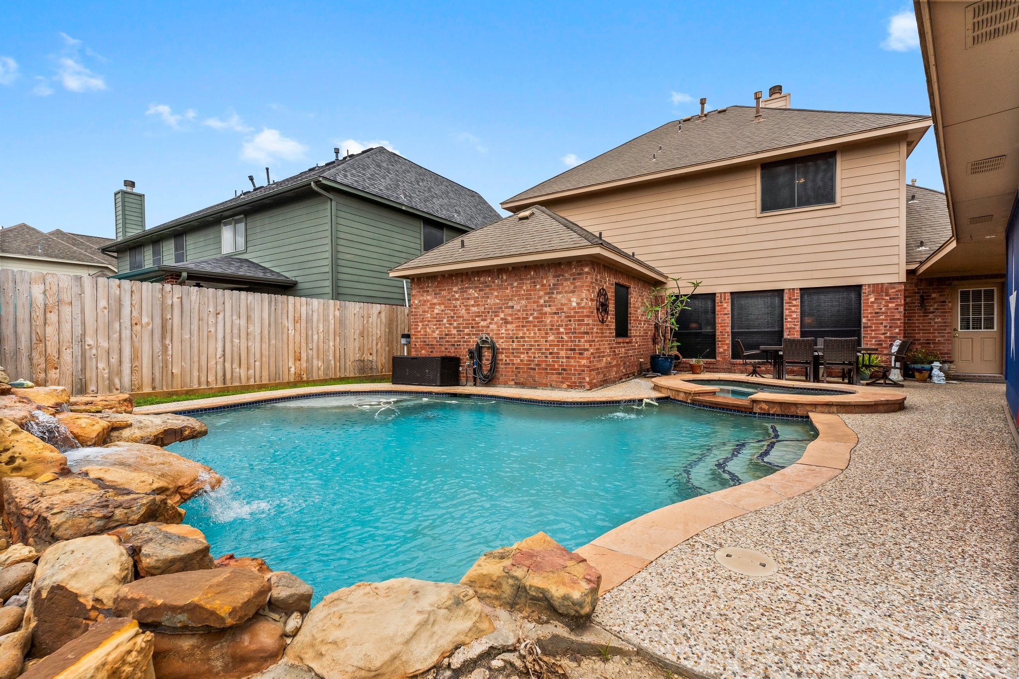 4210 Rainfall Drive Pasadena, TX 77505 - Photo 5 of 46 a front view of house with yard and seating area