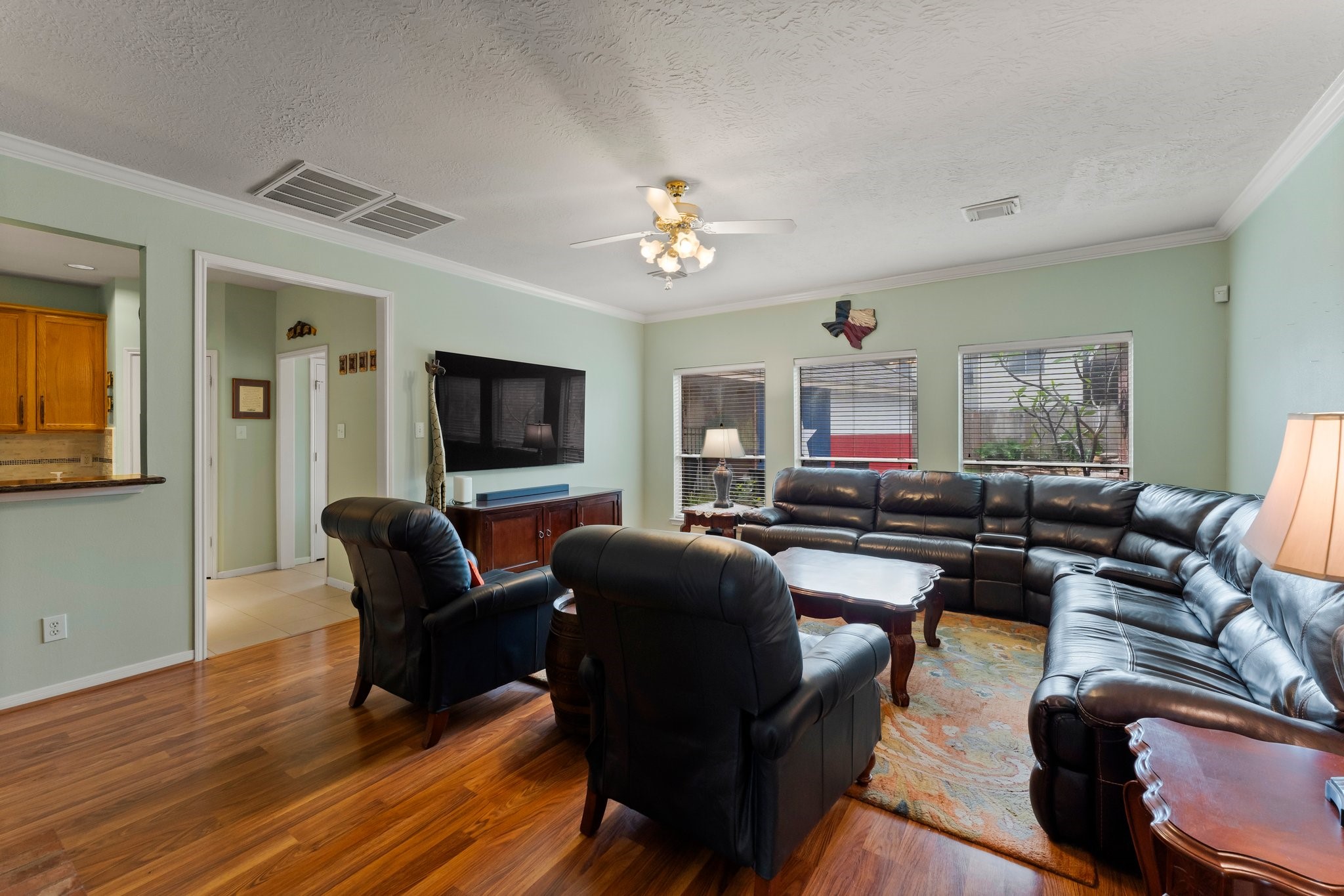4210 Rainfall Drive Pasadena, TX 77505 - Photo 6 of 46 a living room with furniture and a flat screen tv