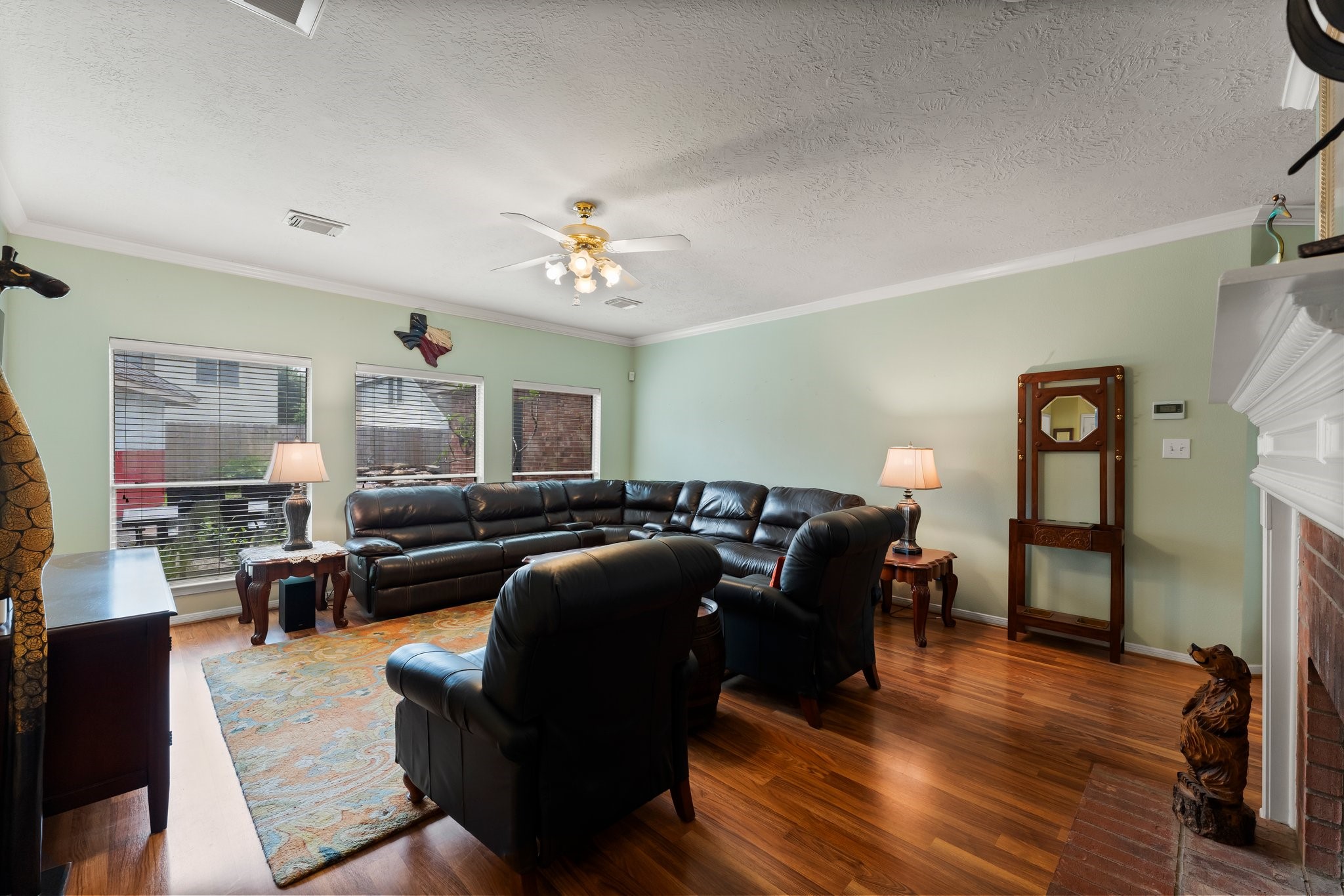 4210 Rainfall Drive Pasadena, TX 77505 - Photo 7 of 46 a living room with furniture and wooden floor