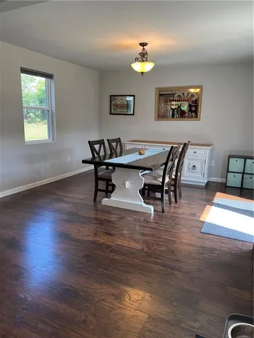 a bathroom with a shower and a bath tub