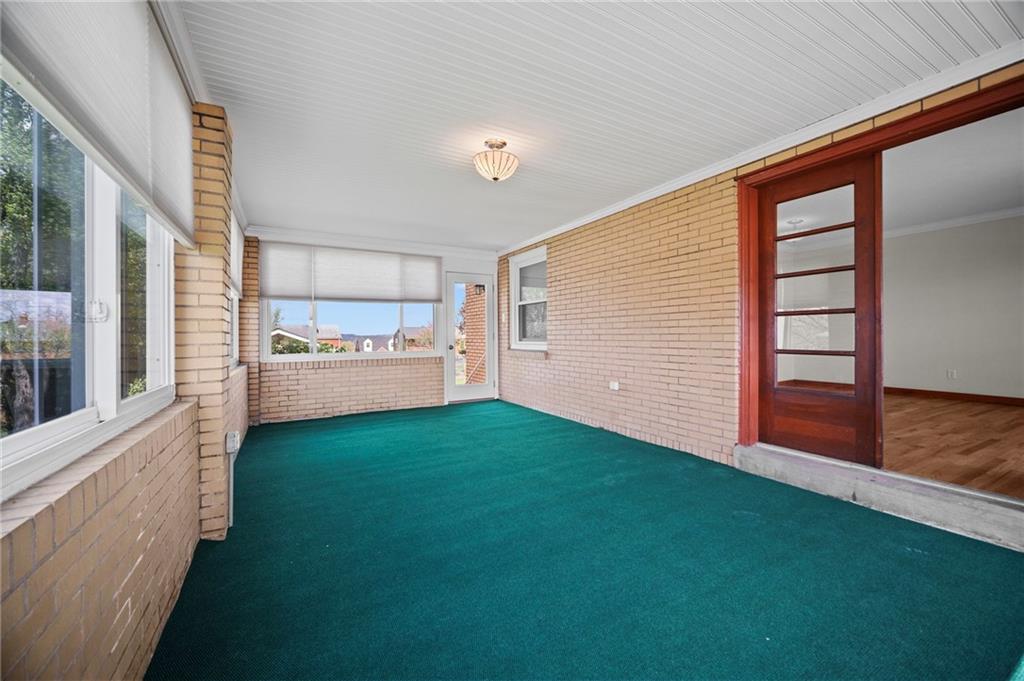 68 Herbst Road Coraopolis, PA 15108 - Photo 13 of 42 Three season room off the living area