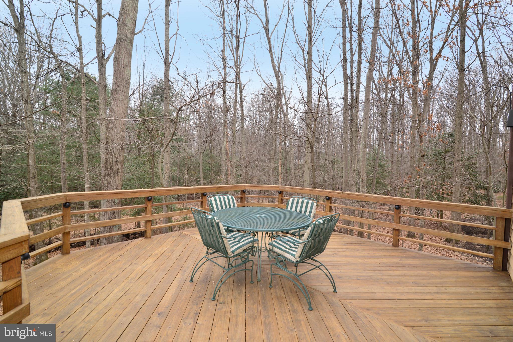 11410 Fieldstone Lane Reston, VA 20191 - Photo 16 of 50 a view of a chairs and table on the wooden floor