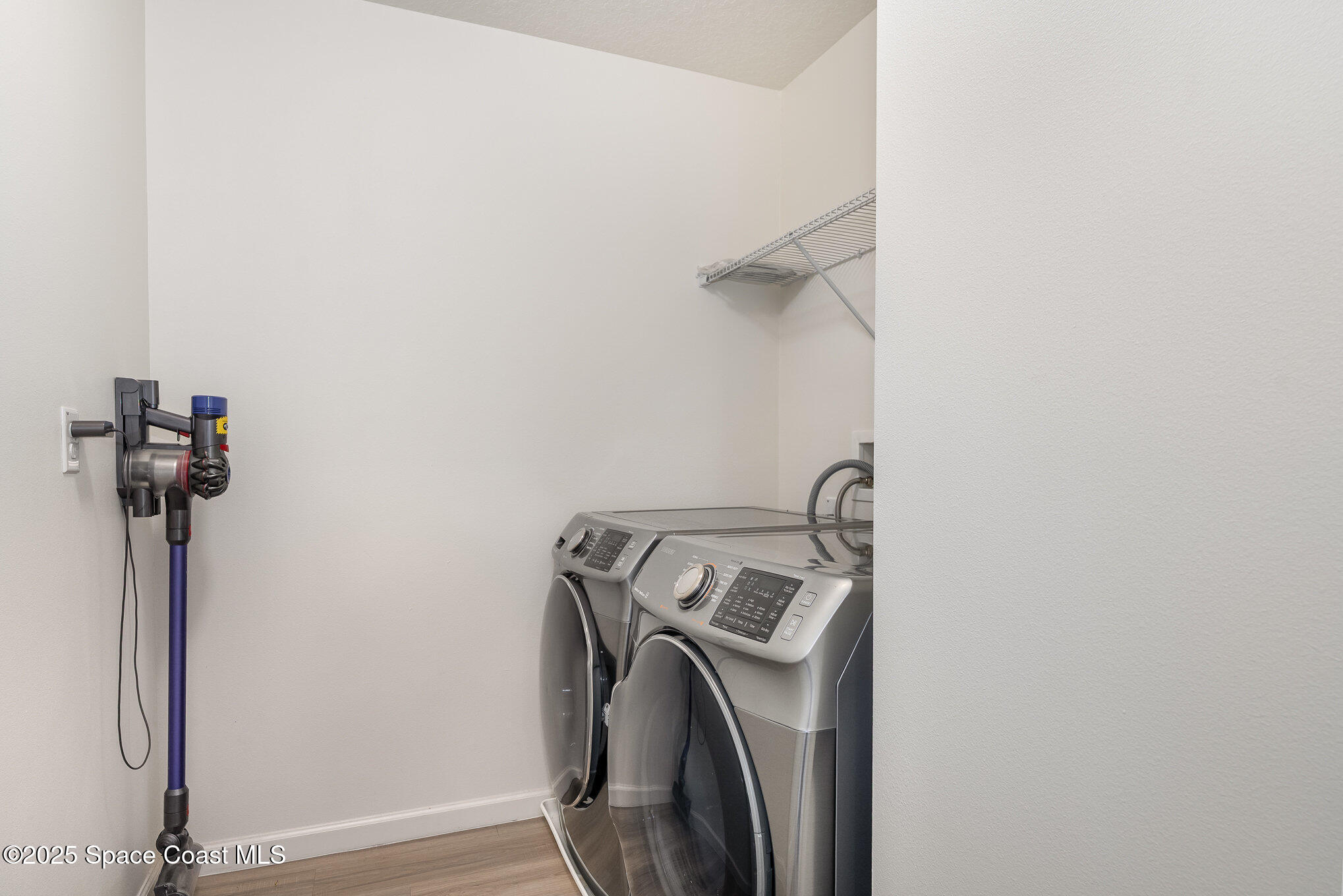 1085 Newton Circle Rockledge, FL 32955 - Photo 29 of 34 a utility room with dryer and washer