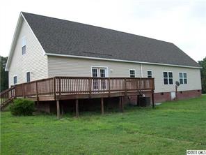 2060 Brer Rabbit Run Rock Hill, SC 29730 - Photo 15 of 16 a view of a house with a backyard and deck