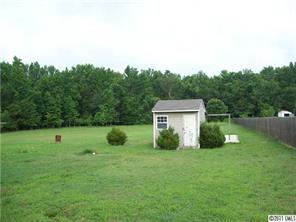 2060 Brer Rabbit Run Rock Hill, SC 29730 - Photo 16 of 16 a view of a garden with a trampoline