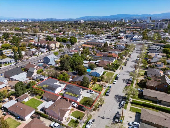 an aerial view of a city with lots of residential buildings