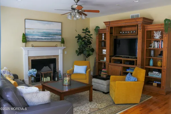 a living room with furniture and a rug