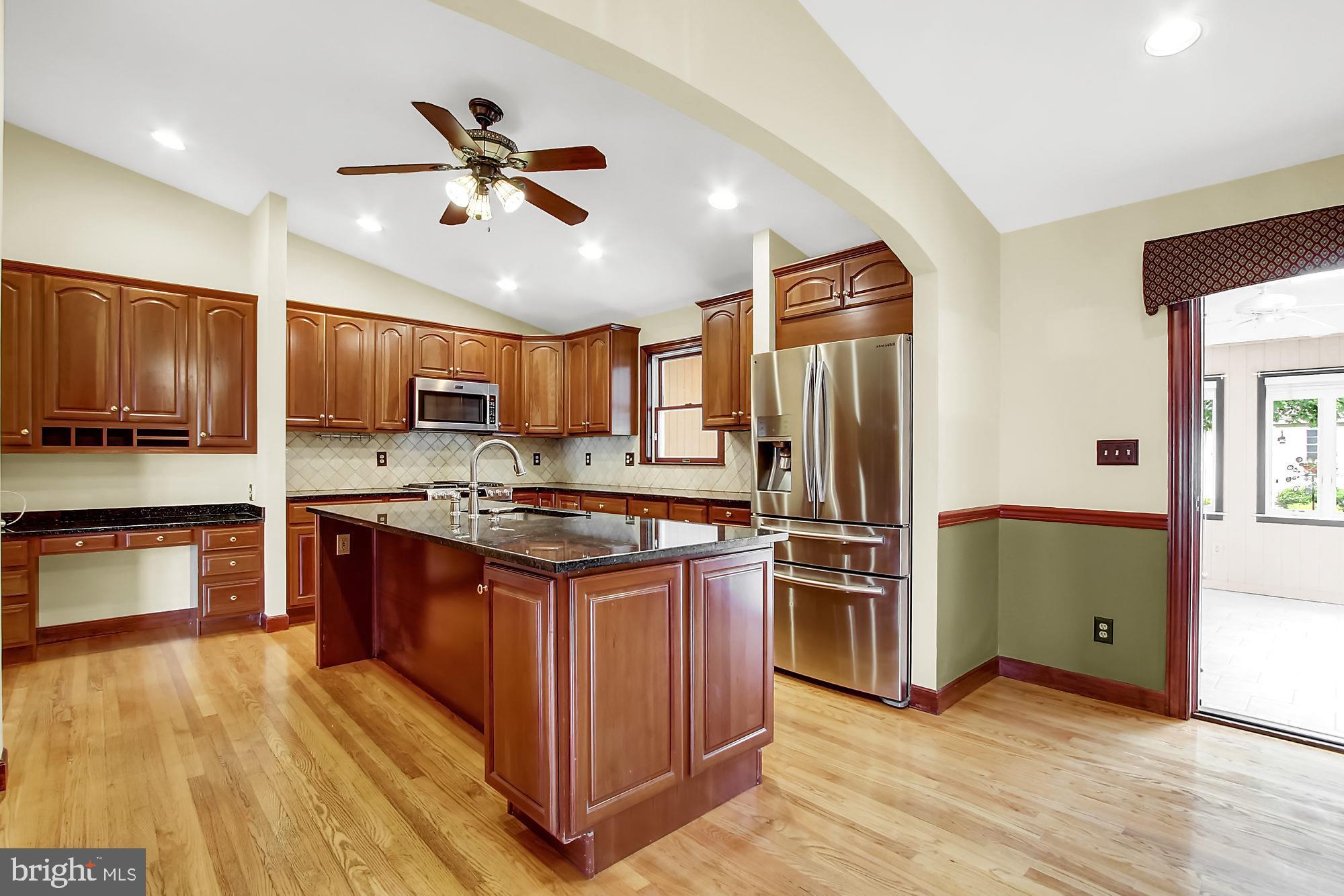 8642 Winding Way Perry Hall, MD 21128 - Photo 11 of 45 Kitchen features heated hardwood floors