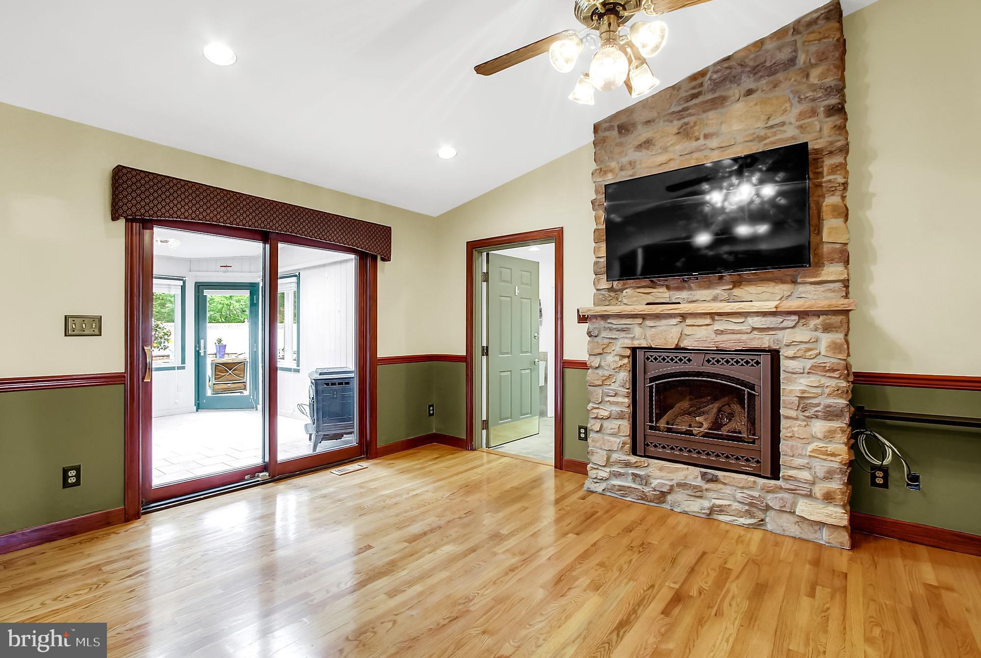 8642 Winding Way Perry Hall, MD 21128 - Photo 16 of 45 Dining Room with beautiful stone gas log FP.