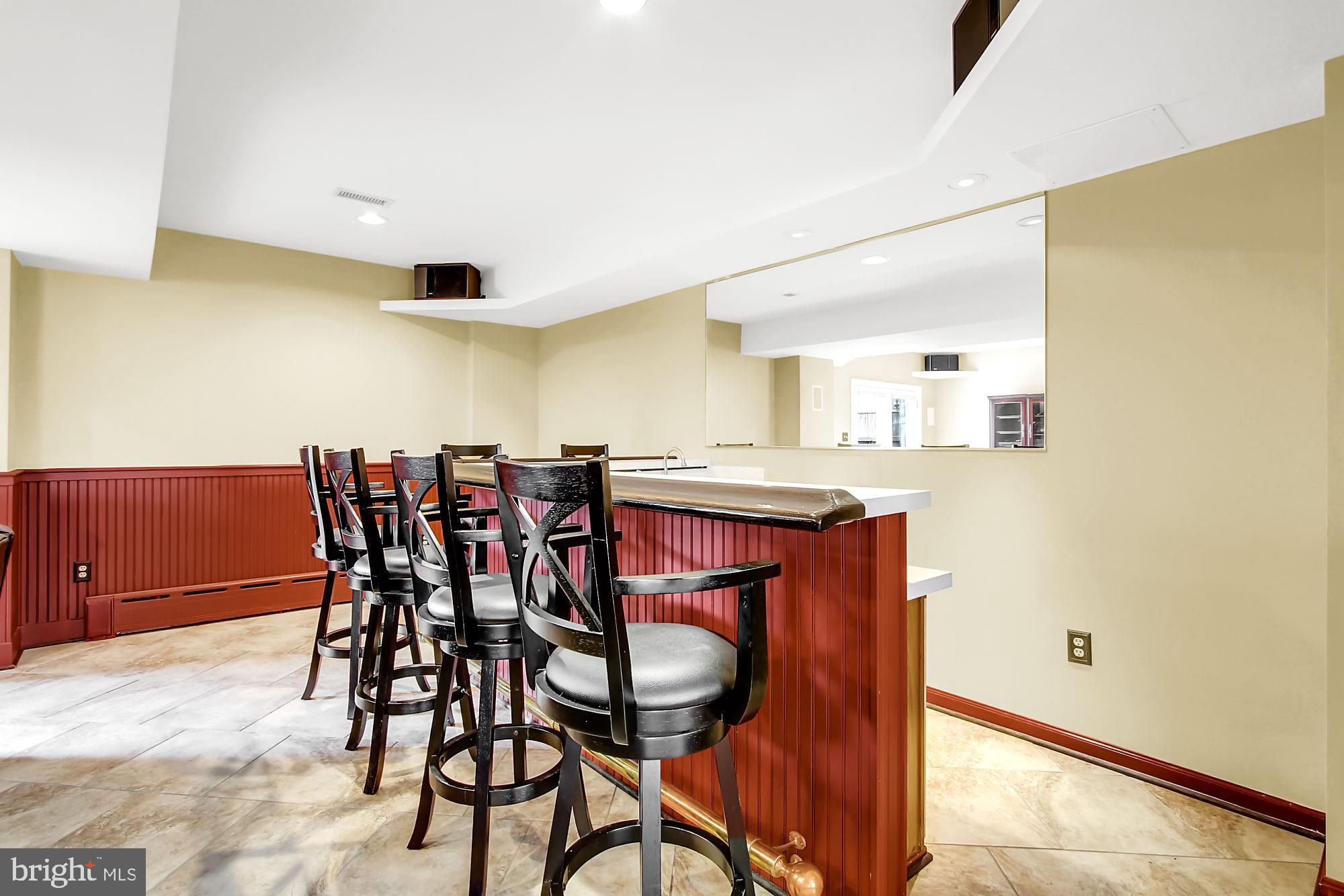 8642 Winding Way Perry Hall, MD 21128 - Photo 35 of 45 Family Room with wet bar and seating
