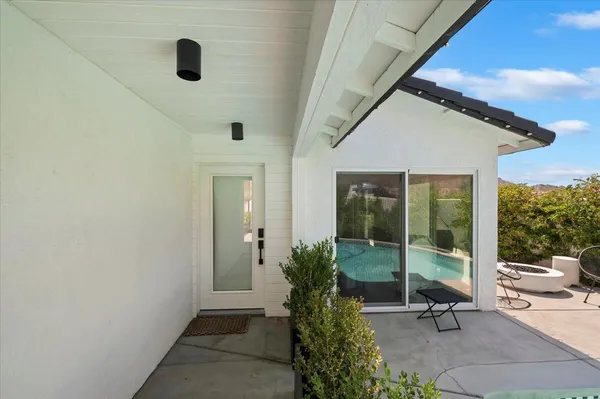 a house view with a garden space
