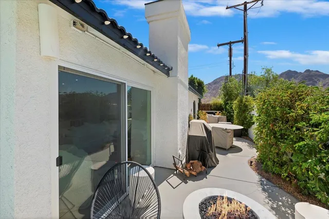 a view of balcony with furniture