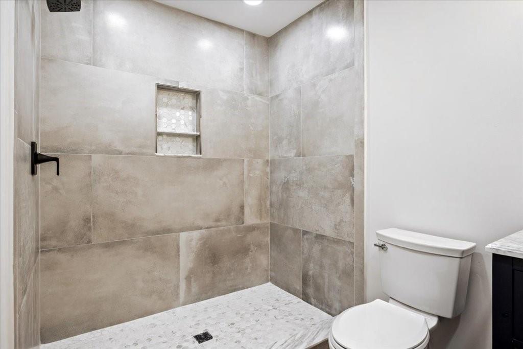 2400 Nebo Road Douglasville, GA 30134 - Photo 12 of 62 a bathroom with a toilet and a shower