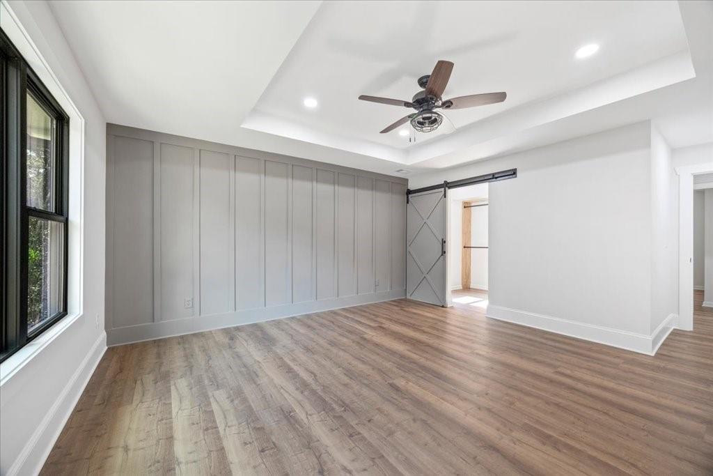 2400 Nebo Road Douglasville, GA 30134 - Photo 25 of 62 a view of an empty room with wooden floor and a window