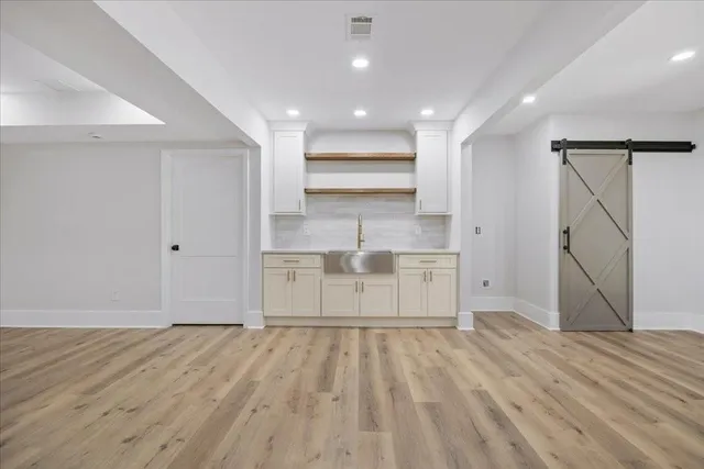 a view of house with wooden floor